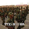 Binh sỹ Libya tham gia duyệt binh trong chiến dịch giải phóng thành phố Derna khỏi các phần tử khủng bố ngày 7/5. (Nguồn: AFP/TTXVN)