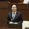 Bộ trưởng Bộ Giáo dục và Đào tạo Phùng Xuân Nhạ trả lời chất vấn các đại biểu Quốc hội. (Ảnh: Văn Điệp/TTXVN)