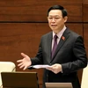 Phó Thủ tướng Vương Đình Huệ trả lời chất vấn của Đại biểu Quốc hội. (Ảnh: Phương Hoa/TTXVN)