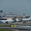 Máy bay thương mại của các hãng hàng không trên thế giới tại sân bay Changi, Singapore. (Nguồn: AFP/TTXVN)