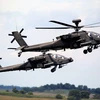 Trực thăng quân sự Apache của Mỹ tham gia một cuộc diễn tập tại Romania ngày 15/7. (Nguồn: THX/TTXVN)