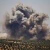 Khói bốc lên sau các cuộc không kích của lực lượng Chính phủ Syria tại Daraa ngày 26/6. Ảnh: (Nguồn: AFP/TTXVN)