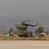 Máy bay trực thăng quân sự của Nga tại căn cứ Hmeimim ở tỉnh Latakia, tây bắc Syria. (Nguồn: AFP/TTXVN)