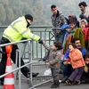 Người di cư tại khu vực biên giới Áo-Đức.(Nguồn: AFP/TTXVN )