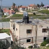 Khu định cư Eshkolot của người dân Israel ở thị trấn Ramadin, Khu Bờ Tây ngày 25/3. (Nguồn: AFP/TTXVN)