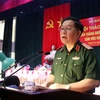 Thượng tướng Nguyễn Trọng Nghĩa, Phó Chủ nhiệm Tổng cục Chính trị Quân đội Nhân dân Việt Nam, phát biểu tại Hội thảo. (Ảnh: Tá Chuyên/TTXVN)
