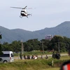 Trực thăng chuyển thành viên đội bóng được cứu khỏi hang Tham Luang tới bệnh viện ở Chiang Rai ngày 9/7. (Ảnh: EPA/ TTXVN)