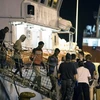 Người di cư tới cảng Pozzallo, Sicily, Italy sau khi được cứu trên biển ngày 16/7. (Nguồn: EPA/ TTXVN)