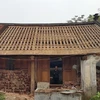Một ngôi nhà ở Làng cổ Đường Lâm bị phá dỡ. (Ảnh minh họa: Đinh Thuận/TTXVN)