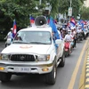  Người dân diễu hành ủng hộ đảng Nhân dân Campuchia (CPP). (Ảnh: Chanh Đa/TTXVN)