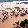 Cảnh ngập lụt sau sự cố vỡ đập thủy điện tại Attapeu ngày 25/7. (Nguồn: EPA/TTXVN)