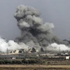 Khói bốc lên sau một cuộc không kích tại khu vực tỉnh Quneitra, miền nam Syria ngày 25/7. (Ảnh: AFP/ TTXVN)