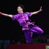 Bài thi đấu của ngôi sao wushu Trung Quốc Sun Peiyuan. (Nguồn: xinhuanet.com)