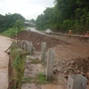 Quốc lộ 6 đoạn qua xã Chiềng Hặc, huyện Yên Châu, Sơn La hư hỏng nặng do mưa lũ. (Ảnh: Nguyễn Chiến/TTXVN)