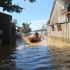 Ngày 21/8, nước từ thượng nguồn đổ về nhanh đã khiến hàng loạt xã của huyện Thanh Chương, tỉnh Nghệ An bị ngập nặng. (Ảnh: Nguyễn Oanh/TTXVN)