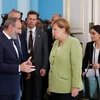 Thủ tướng Armenia Nikol Pashinyan (trái) trong cuộc gặp Thủ tướng Đức Angela Merkel (phải, phía trước) tại Yerevan ngày 24/8. (Ảnh: THX/ TTXVN)