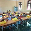 Các em học sinh trong những phòng học mới khang trang. (Ảnh: Khiếu Tư/TTXVN)