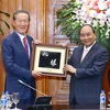 Thủ tướng Nguyễn Xuân Phúc tiếp ông Chang Soo Huh, Chủ tịch Liên đoàn Công nghiệp Hàn Quốc, Chủ tịch Tập đoàn GS Holdings. (Ảnh: Thống Nhất/TTXVN)