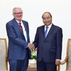 Thủ tướng Nguyễn Xuân Phúc tiếp Thứ trưởng phụ trách thương mại quốc tế, Bộ Thương mại Hoa Kỳ, ông Gilbert Kaplan. (Ảnh: Thống Nhất/TTXVN)