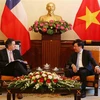 Phó Thủ tướng, Bộ trưởng Bộ Ngoại giao Phạm Bình Minh tiếp Bộ trưởng Bộ Ngoại giao Cộng hòa Chile. (Ảnh: Dương Giang/TTXVN)
