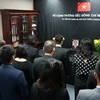 Cán bộ, nhân viên các cơ quan đại diện Việt Nam tại Sydney, Australia viếng Chủ tịch nước Trần Đại Quang. (Ảnh: TTXVN)