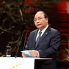 Thủ tướng Nguyễn Xuân Phúc phát biểu tại Phiên khai mạc Hội nghị thượng đỉnh P4G. (Ảnh: Thống Nhất/TTXVN)