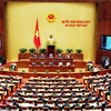 Thủ tướng Chính phủ Nguyễn Xuân Phúc trình bày Báo cáo về tình hình kinh tế - xã hội năm 2018 và kế hoạch phát triển kinh tế - xã hội năm 2019. (Ảnh: Nguyễn Dân/TTXVN)