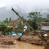 Người dân xã Nghĩa Đô, huyện Bảo Yên, Lào Cai khắc phục nhà cửa sau mưa lũ. (Ảnh: Quốc Khánh/TTXVN)