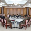 Phái đoàn Hàn Quốc, Triều Tiên và Bộ tư lệnh LHQ tại cuộc hội đàm ba bên về việc giải trừ vũ khí và rút binh sỹ khỏi khu vực JSA, ở làng đình chiến Panmunjom ngày 22/10. (Ảnh: THX/TTXVN)