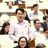 Đại biểu Quốc hội tỉnh Quảng Bình Nguyễn Văn Man phát biểu. (Ảnh: Văn Điệp/TTXVN)