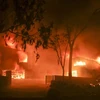 Các đám cháy rừng lan rộng ở Malibu, California ngày 9/11. (Ảnh: THX/TTXVN)