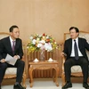 Phó Thủ tướng Trịnh Đình Dũng tiếp Đại sứ Kim Do Hyun. (Ảnh: Nguyễn Dân/TTXVN)