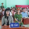 Tại phiên tòa Huỳnh Thục Vy xin phép ngồi nghe xử án vì lý do sức khỏe. (Ảnh: Phạm Cường/TTXVN)