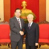 Tổng Bí thư, Chủ tịch nước Nguyễn Phú Trọng tiếp Chủ tịch Đảng Cộng sản Nhật Bản Kazuo Shii. (Ảnh: Trí Dũng/TTXVN)