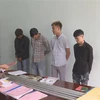Cơ quan Cảnh sát điều tra Công an huyện Krông Năng làm việc với các đối tượng tại trụ sở. (Ảnh: TTXVN phát)