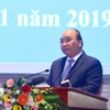 Thủ tướng Nguyễn Xuân Phúc đọc diễn văn tại Lễ kỷ niệm. (Ảnh: Thống Nhất/TTXVN)