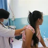 Một thai phụ mắc bệnh sởi đang điều trị tại Bệnh viện Bệnh Nhiệt đới Thành phố Hồ Chí Minh. (Ảnh: Đinh Hằng/TTXVN)