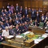 Thủ tướng Anh Theresa May (trái, phía trước) trong phiên họp của Hạ viện ở London ngày 14/1/2019. (Ảnh: AFP/TTXVN)