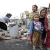 Trẻ em tị nạn Iraq tại khu vực Sadr City, ngoại ô Baghdad. (Ảnh: AFP/ TTXVN)