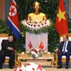 Thủ tướng Nguyễn Xuân Phúc hội kiến Chủ tịch Triều Tiên Kim Jong-un. (Ảnh: Thống Nhất/TTXVN)