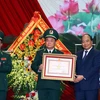  Thủ tướng Nguyễn Xuân Phúc trao tặng Huân chương Quân công hạng Nhất của Chủ tịch nước cho lực lượng Bộ đội Biên phòng. (Ảnh: Thống Nhất/TTXVN)