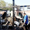 Vụ hỏa hoạn đã thiêu rụi 9 căn nhà của bà con người dân tộc Chăm (với 57 nhân khẩu). (Ảnh: Công Mạo/TTXVN)