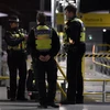 Cảnh sát Anh điều tra sau vụ đâm dao tại ga tàu Victoria ở thành phố Manchester ngày 1/1/2019. (Ảnh: AFP/TTXVN)