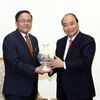 Thủ tướng Nguyễn Xuân Phúc tiếp Bộ trưởng Hợp tác quốc tế Myanmar U Kyaw Tin. (Ảnh: Thống Nhất/TTXVN)