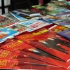 Các ấn phẩm trưng bày tại Hội báo Xuân Kỷ Hợi 2019 tại Sơn La. (Ảnh: Diệp Anh/TTXVN)