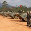 Đội hình xe thiết giáp Trung Quốc tham gia tập trận. (Nguồn: Nhóm phóng viên CQTT TTXVN tại Campuchia)