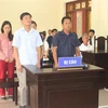 4 bị cáo tại phiên tòa. (Ảnh: Nguyễn Chinh/TTXVN)