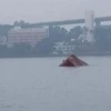 Một vụ chìm tàu ở Quảng Ninh. (Ảnh: TTXVN phát)