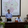 Phó Chủ tịch UBND tỉnh Bình Phước Huỳnh Anh Minh phát biểu tại buổi đối thoại. (Ảnh: Dương Chí Tưởng/TTXVN)
