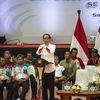 Tổng thống Indonesia Joko Widodo (giữa) trong chiến dịch vận động tranh cử Tổng thống ở Sragen, Trung Java ngày 3/4/2019. (Ảnh: AFP/TTXVN)